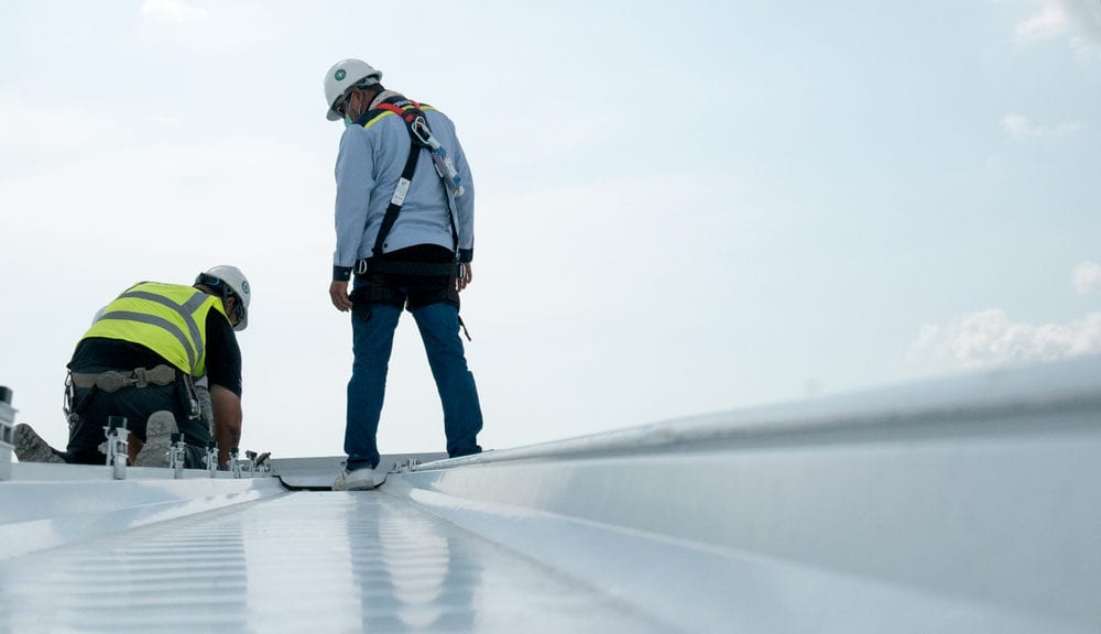 Roofers installing a new roof