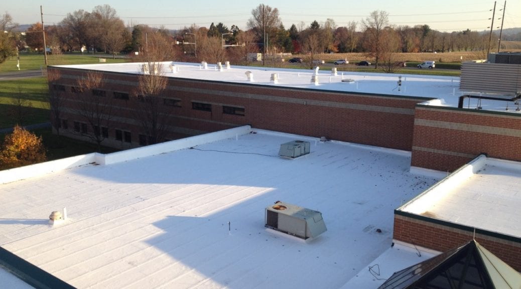Commercial roof with elastomeric coating installed by Heidler Roofing