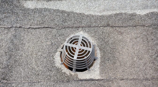 A drain on a commercial roof.