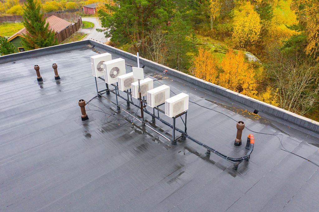 A low-slope roof being after inspection and repair